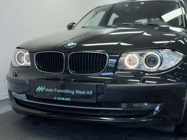 bmw-1-serie-bensin-2008-big-3