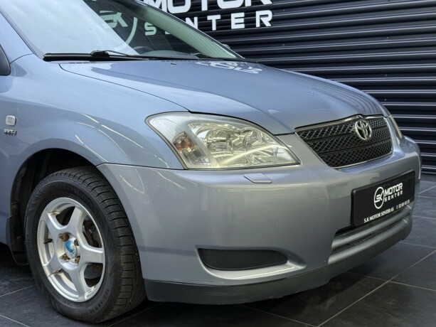 toyota-corolla-bensin-2004-big-2