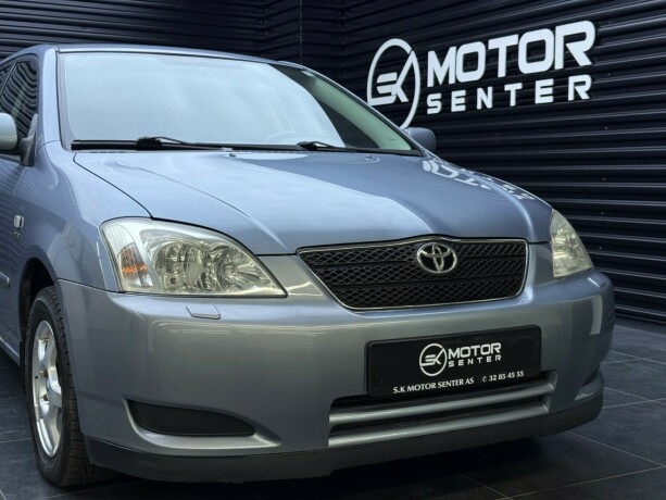 toyota-corolla-bensin-2004-big-3