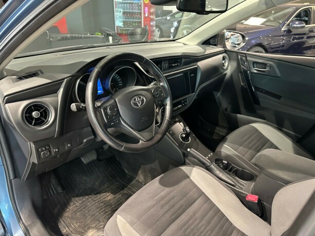 toyota-auris-elektrisitetbensin-2015-big-8