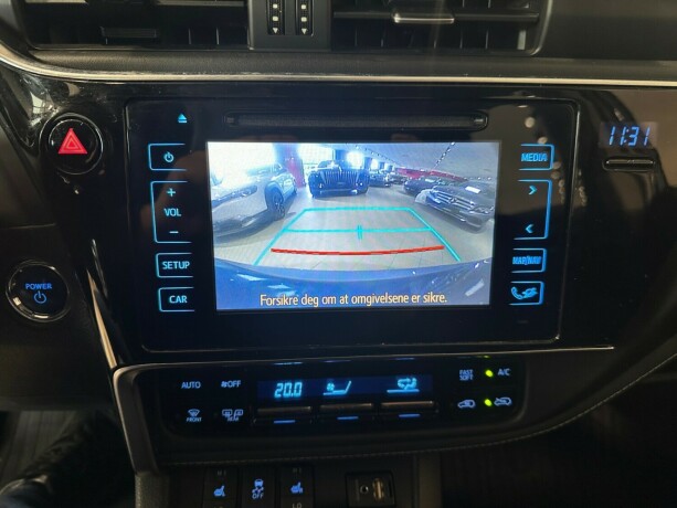 toyota-auris-elektrisitetbensin-2015-big-21