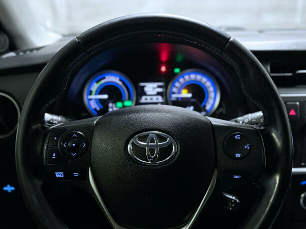 toyota-auris-elektrisitetbensin-2014-big-14