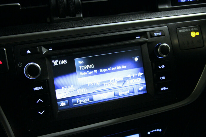 toyota-auris-elektrisitetbensin-2014-big-11