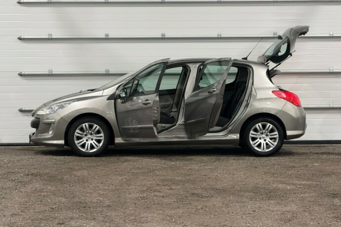 peugeot-308-bensin-2011-big-5