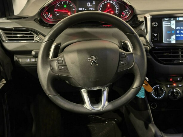peugeot-208-bensin-2014-big-14