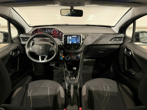 peugeot-208-bensin-2014-big-13