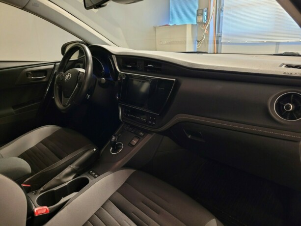 toyota-auris-elektrisitetbensin-2016-big-14