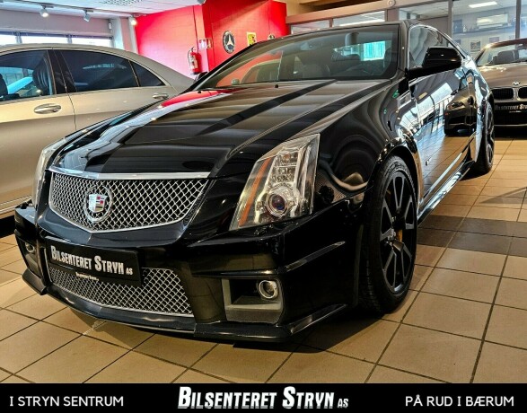 cadillac-cts-bensin-2013-big-0