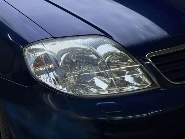 toyota-corolla-bensin-2005-big-3