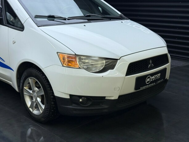 mitsubishi-colt-bensin-2010-big-2