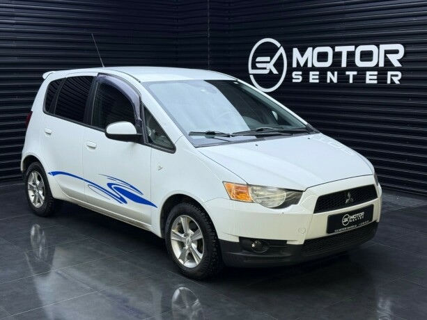 mitsubishi-colt-bensin-2010-big-0