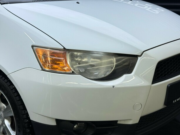 mitsubishi-colt-bensin-2010-big-3