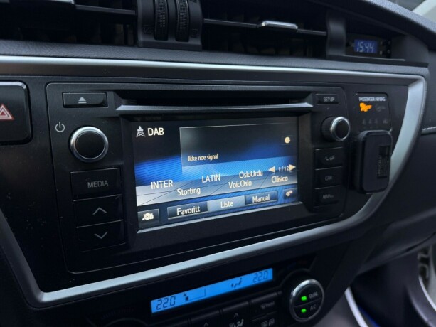 toyota-auris-elektrisitetbensin-2015-big-21