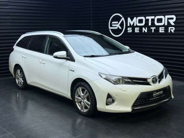 toyota-auris-elektrisitetbensin-2015-big-0