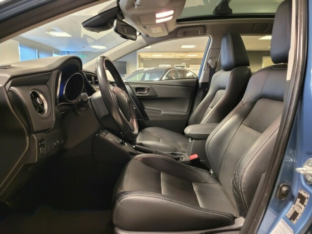 toyota-auris-elektrisitetbensin-2015-big-19