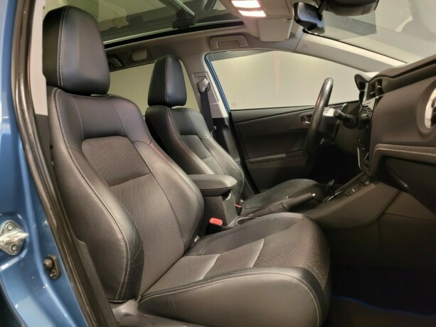 toyota-auris-elektrisitetbensin-2015-big-13