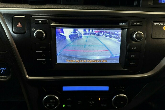 toyota-auris-elektrisitetbensin-2014-big-19