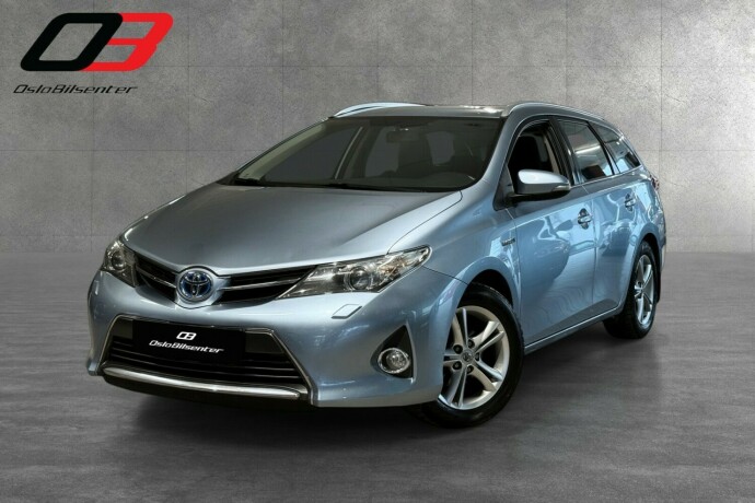 toyota-auris-elektrisitetbensin-2014-big-0