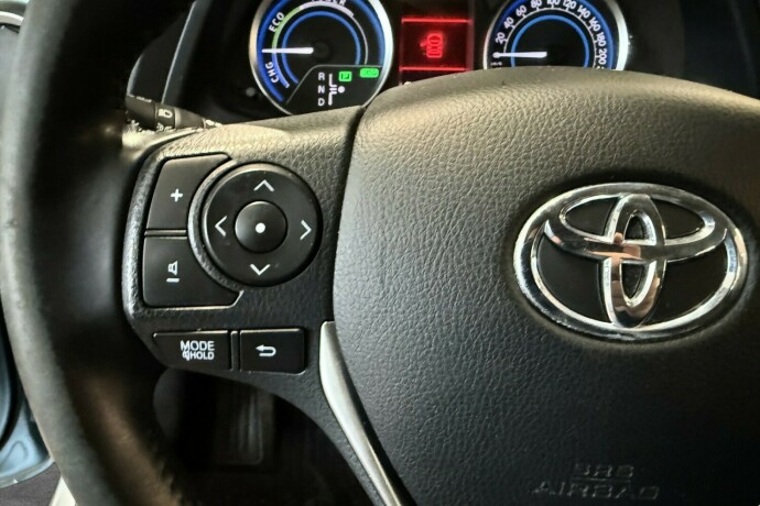 toyota-auris-elektrisitetbensin-2014-big-23