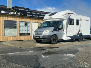 Roller Team | T-Line XL S, Queensbed, Senkeseng, Webasto, Stort kjøleskap, Registerkjede, Lav KM | Diesel | 2013