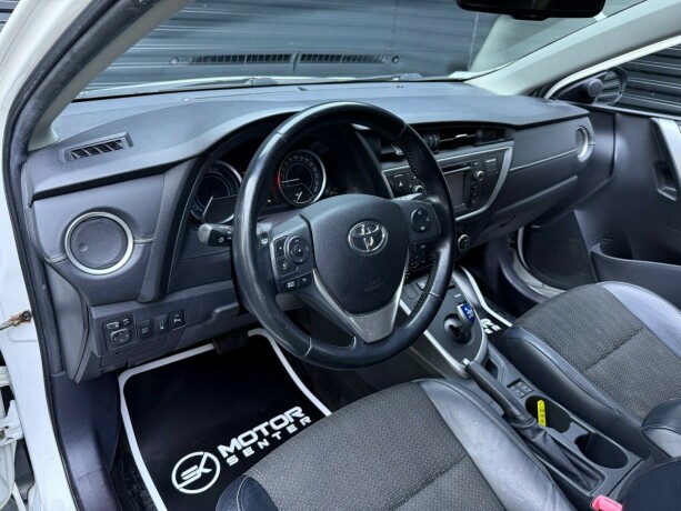 toyota-auris-elektrisitetbensin-2014-big-11