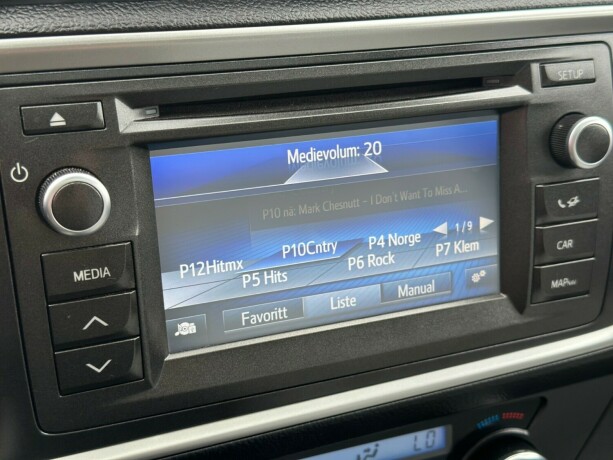 toyota-auris-elektrisitetbensin-2014-big-18