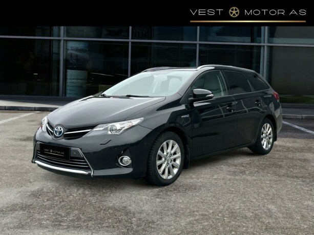 toyota-auris-elektrisitetbensin-2014-big-2