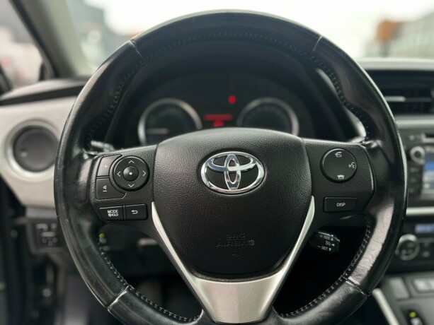 toyota-auris-elektrisitetbensin-2014-big-22