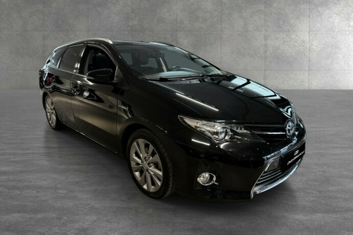 toyota-auris-elektrisitetbensin-2015-big-6