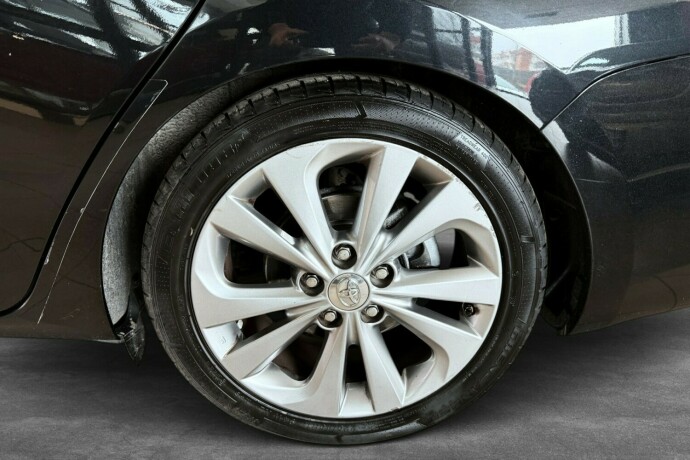 toyota-auris-elektrisitetbensin-2015-big-26