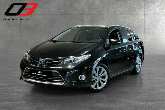 toyota-auris-elektrisitetbensin-2015-big-0