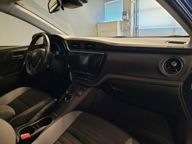 toyota-auris-elektrisitetbensin-2016-big-13