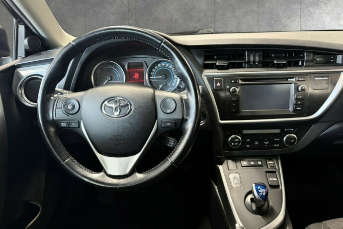 toyota-auris-elektrisitetbensin-2015-big-11