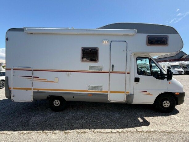 sunlight-alkove-dobbelseng-bak-vanlig-f248rerkort-truma-kombi-god-nyttelast-diesel-2007-big-3