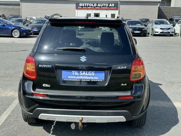 suzuki-sx4-bensin-2011-big-3