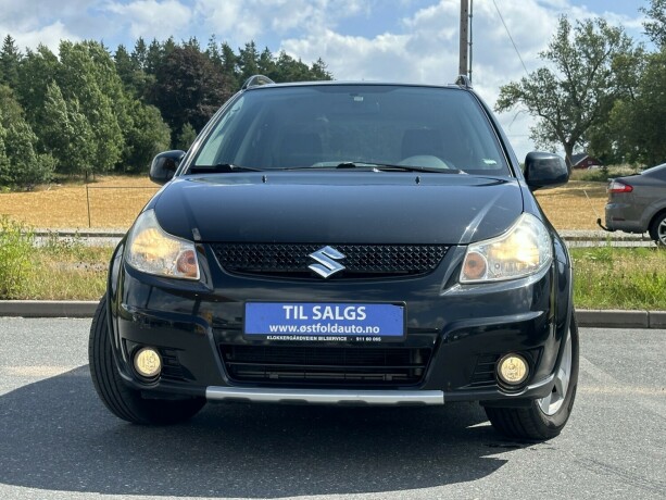 suzuki-sx4-bensin-2011-big-1