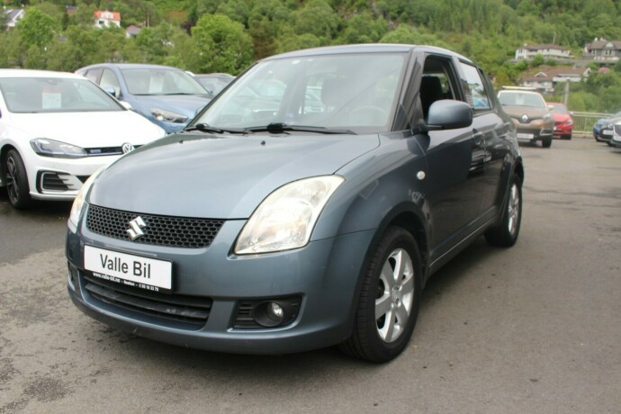 suzuki-swift-bensin-2010-big-1
