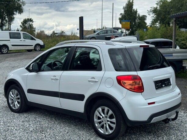 suzuki-sx4-bensin-2015-big-2