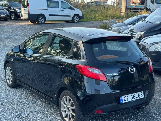mazda-2-bensin-2012-big-2