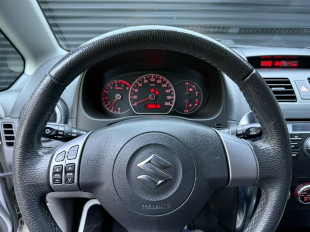 suzuki-sx4-bensin-2009-big-12
