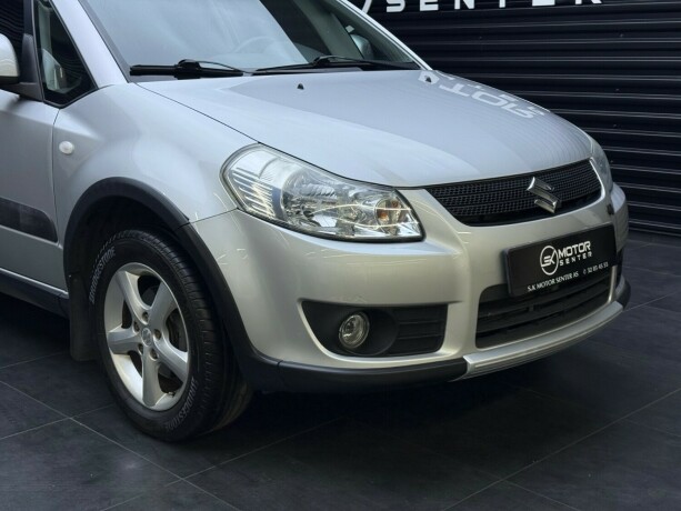 suzuki-sx4-bensin-2009-big-2
