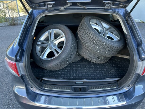 toyota-avensis-bensin-2010-big-8