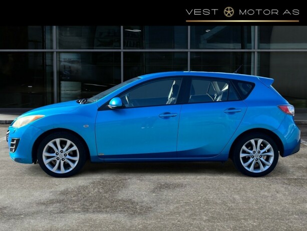 mazda-3-bensin-2009-big-3