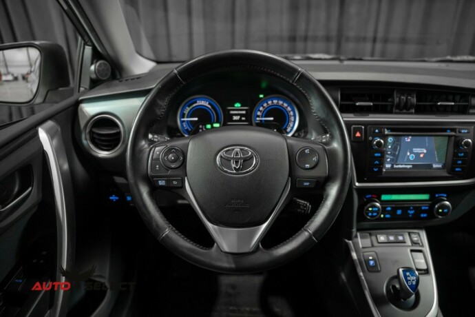 toyota-auris-elektrisitetbensin-2013-big-22