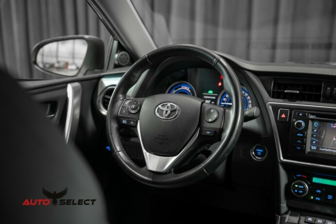 toyota-auris-elektrisitetbensin-2013-big-21