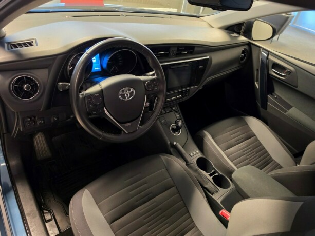 toyota-auris-elektrisitetbensin-2015-big-18