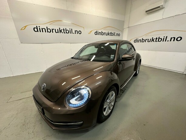 volkswagen-beetle-bensin-2013-big-1
