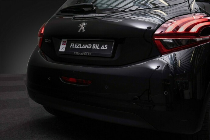 peugeot-208-bensin-2015-big-9