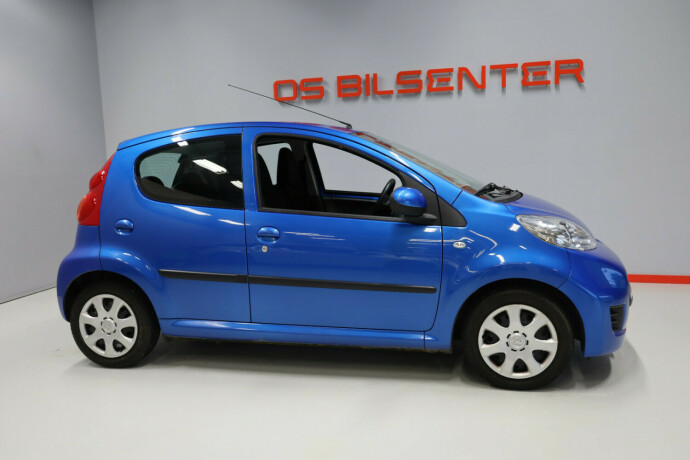 peugeot-107-bensin-2011-big-2