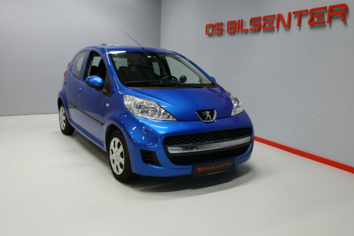 peugeot-107-bensin-2011-big-1